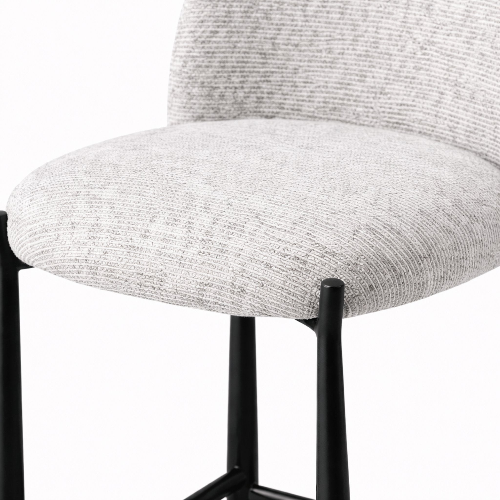 Detail of Ava counter chair black metal legs and footrest with durable modern construction