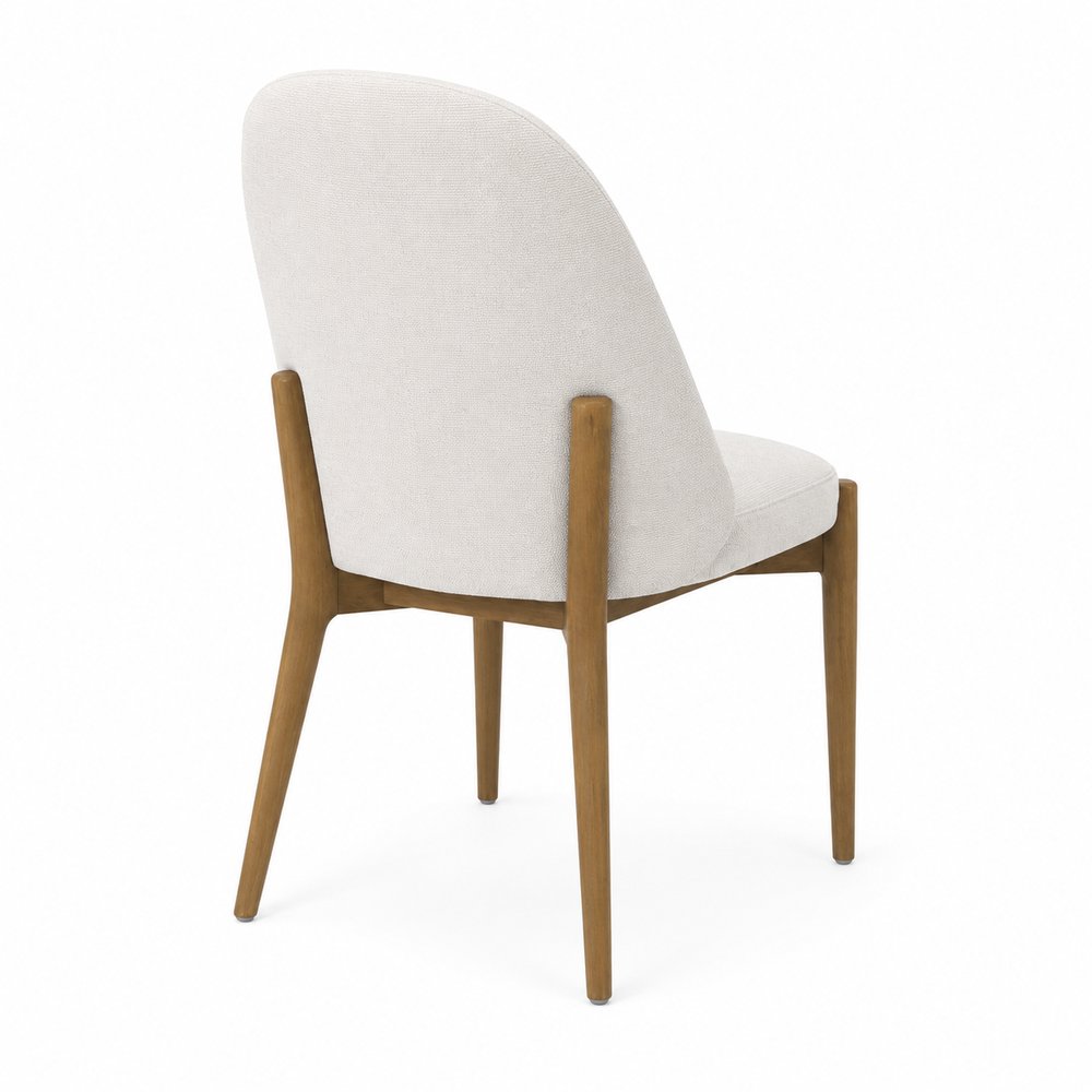 Rear three-quarter view of the Liam dining chair in Natural performance fabric with natural oak wood frame on a white background.
